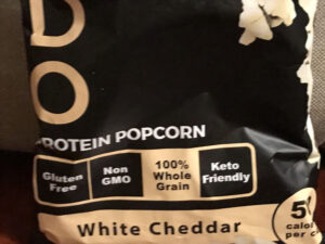 White cheddar protein popcorn snack