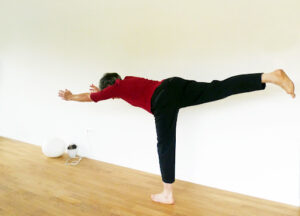 A woman practising yoga.