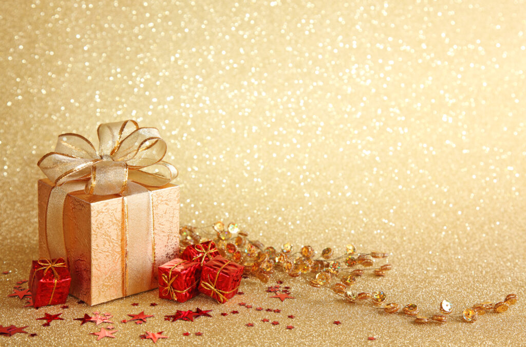 A beautifully wrapped-up gift in gold color and trim.